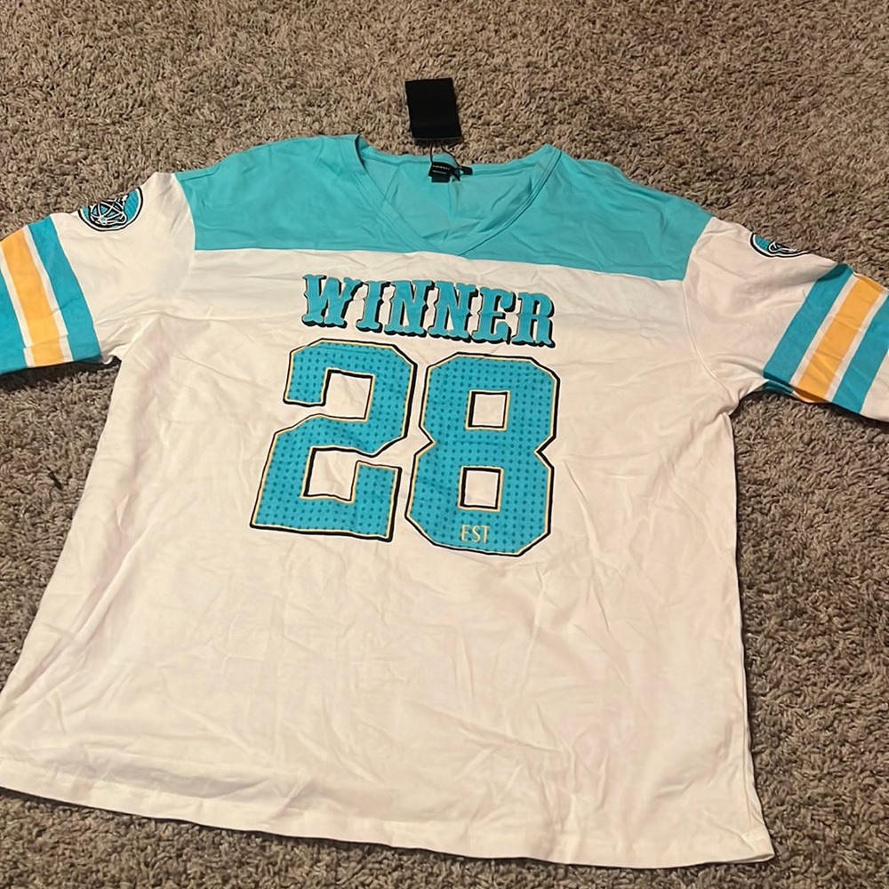 winner 28 blue and gold color shirt